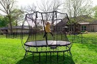 Load image into Gallery viewer, girl jumping high on a trampoline