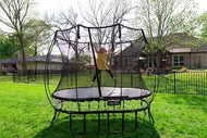 Load image into Gallery viewer, girl jumping high on a trampoline
