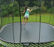 Load image into Gallery viewer, girl jumping on a trampoline