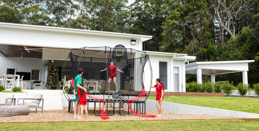 How to Landscape Around a Trampoline: Plantings, Borders, and Design Ideas That Make It Look Intentional