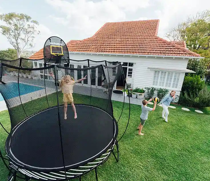 girl jumping on a trampoline